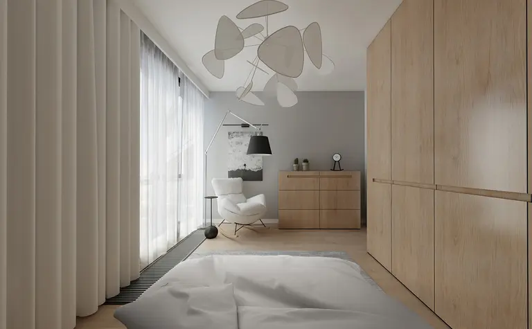 Wnętrze minimalistycznego pokoju z drewnianymi meblami i jasnymi zasłonami.