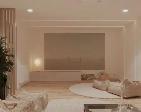 Minimalistyczny i nowoczesny salon z jasnymi meblami i oświetleniem.