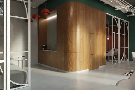 Wnętrze kuchni z drewnianymi meblami, zielonymi ścianami, minimalistycznym designem.