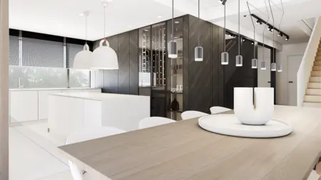 Wnętrze kuchni w stylu minimalistycznym z białymi meblami i czarnymi detalami.