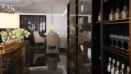 Wnętrze jadalni w stylu art deco i glamour z czarnym blatem i beżowymi krzesłami.