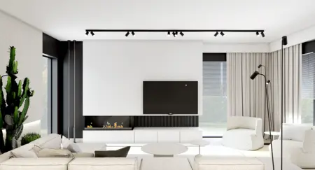 Wnętrze salonu w stylu minimalistycznym i skandynawskim z jasnymi meblami.