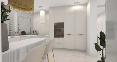 Nowoczesna kuchnia z białymi meblami, złotymi detalami i eleganckim oświetleniem.
