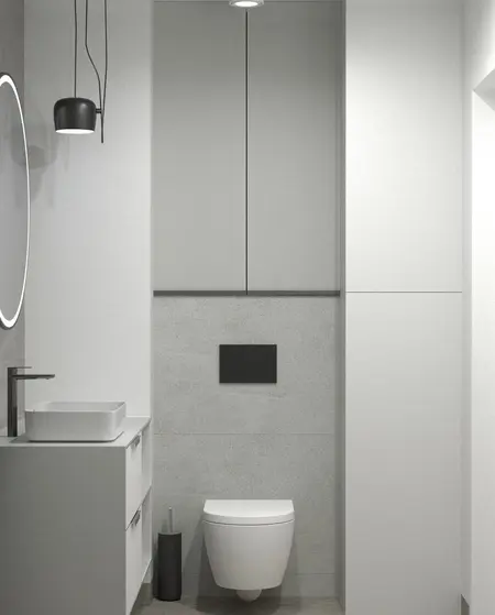 Nowoczesna łazienka z minimalistycznym designem, białymi meblami i szarymi akcentami.