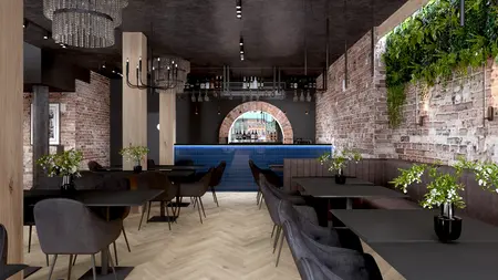 Wnętrze restauracji z industrialnym stylem, drewniane elementy, bar i roślinność.