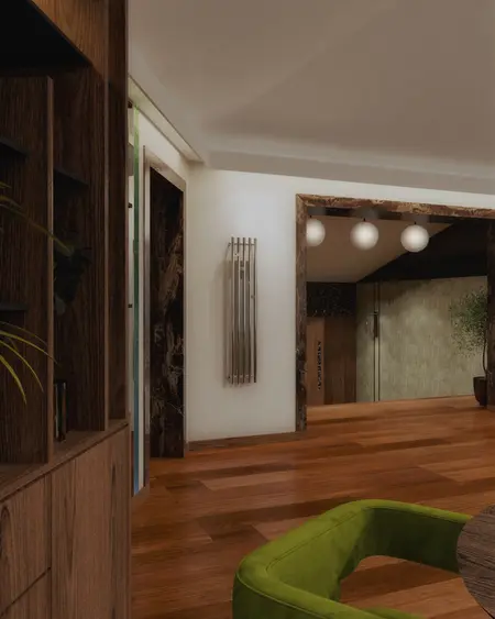 Wnętrze z elementami art deco i quiet luxury, z zieloną sofą oraz drewnianą podłogą.