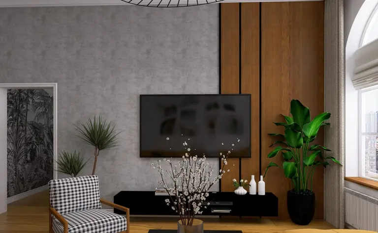 Wnętrze salonu z telewizorem, roślinami oraz nowoczesnym meblem.