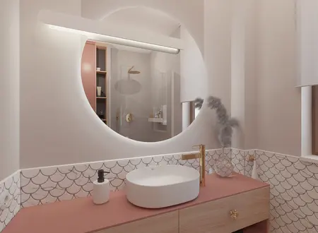 Wnętrze łazienki z różowymi meblami, złotymi akcentami i płytkami w stylu boho oraz minimalizm.