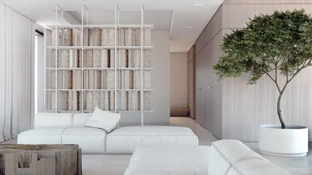Wnętrze salonu w stylu japandi i minimalistycznym z jasnymi meblami.