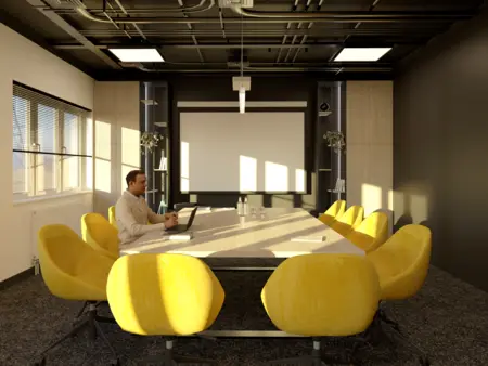 Sala konferencyjna z żółtymi krzesłami i drewnianym stołem w stylu industrialnym.