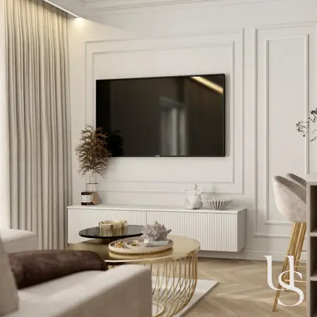 Nowoczesny salon z białymi meblami i złotymi detalami w stylu glamour.