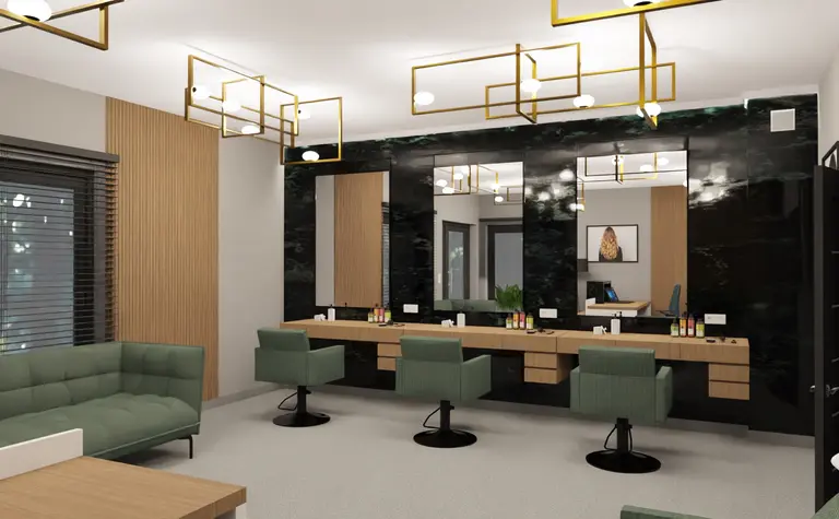 Wnętrze salonu z glamour i industrialnym stylem, zielone fotele, drewniany blat, lustra.