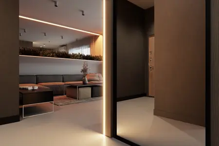 Eklektyczne wnętrze salonu z minimalistycznym designem, miękkim minimalizmem i roślinnymi akcentami.