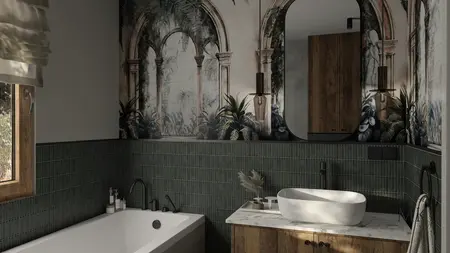 Wnętrze łazienki w stylu art deco i boho z zielonymi płytkami i drewnianymi elementami.