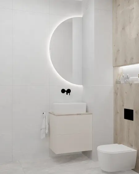 Minimalistyczna łazienka z nowoczesną umywalką i drewnianymi elementami.