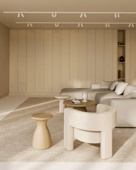 Minimalistyczny salon w stylu soft minimalizm z jasnymi meblami.