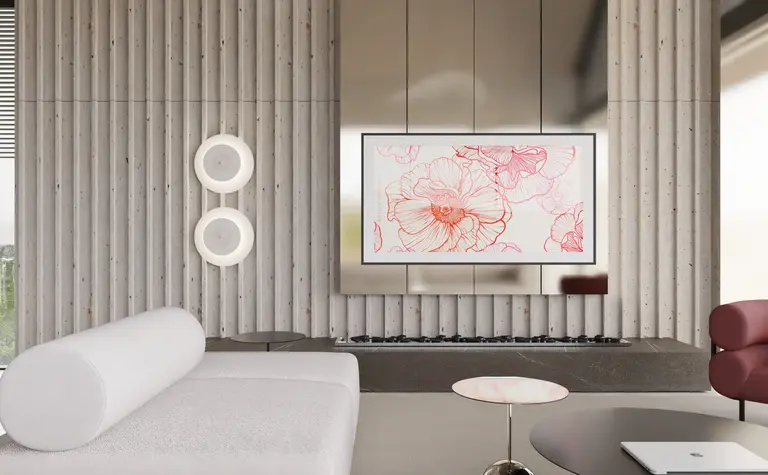 Nowoczesny salon z minimalistycznym wystrojem, szarymi ścianami i eleganckimi meblami.