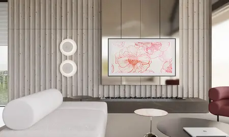 Nowoczesny salon z minimalistycznym wystrojem, szarymi ścianami i eleganckimi meblami.