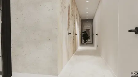 Korytarz z jasnymi ścianami i rośliną w doniczce, nowoczesny design.