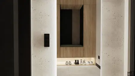 Nowoczesny przedpokój z drewnianą szafką i oświetleniem LED, minimalistyczny design.