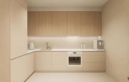 Kuchnia w stylu japandi z minimalistycznymi meblami i nowoczesnym wyposażeniem.