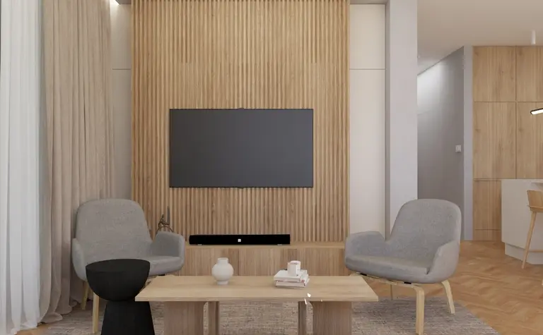 Nowoczesny salon w stylu japandi z drewnianą ścianą i szarymi meblami.