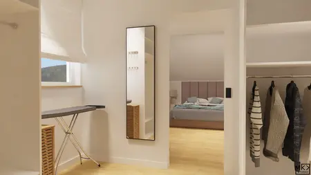 Garderoba z lustrzanym odbiciem, drewnianą podłogą i szafą na ubrania w stylu współczesnym.