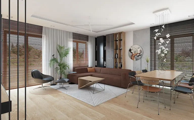 Wnętrze salonu w stylu dopamine decor, minimalistycznym i soft minimalizm z brązową kanapą.