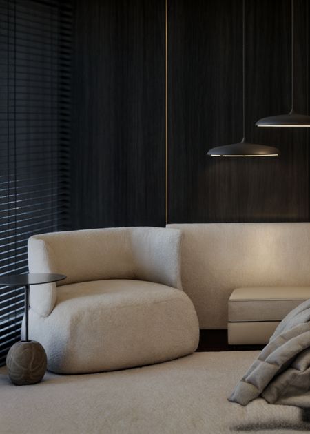 Eklektyczne wnętrze salonu z minimalistycznymi meblami, w stylu japandi i quiet luxury.