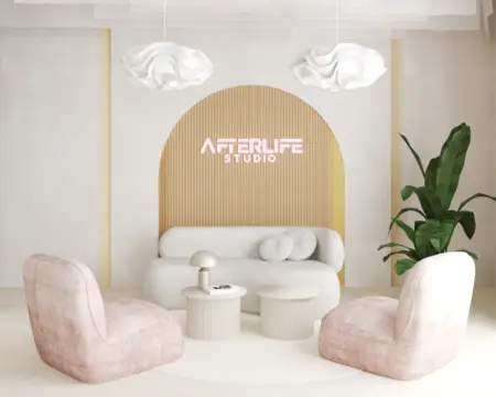 Wnętrze w stylu soft minimalizm z jasnymi meblami, rośliną i nowoczesnym oświetleniem.