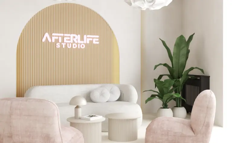 Wnętrze w stylu soft minimalizm z jasnymi meblami i rośliną