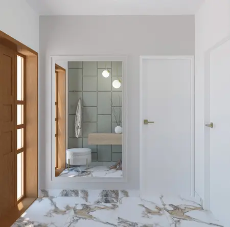 Wnętrze przedpokoju w stylu quiet luxury z szarymi płytkami, białym meblem i lustrem.