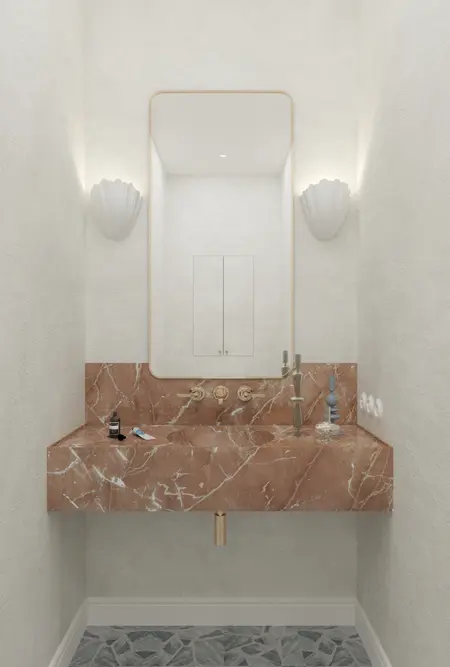 Wnętrze łazienki z marmurową umywalką, lustrem i elementami art deco, minimaluxe, quiet luxury.