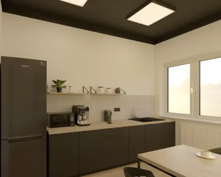 Kuchnia w stylu industrialnym z czarnymi meblami i drewnianym blatem.