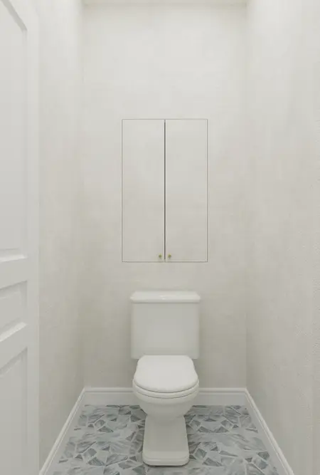 Toaleta w stylu art deco z białą ceramiką i szarym wykończeniem, minimalistyczne detale.