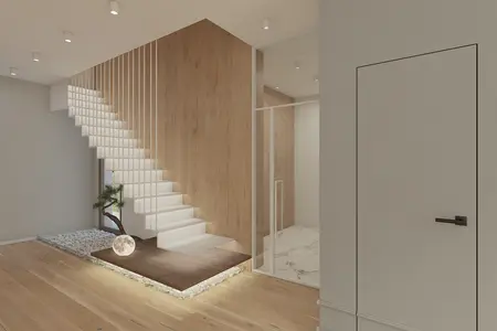Wnętrze w stylu japandi i minimalistycznym z drewnianymi schodami i roślinami.