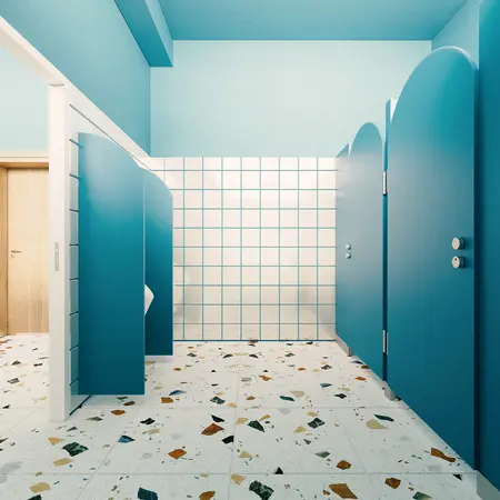 Wnętrze łazienki z niebieskimi kabinami i nowoczesną podłogą w stylu dopamine decor.