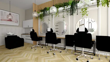 Wnętrze salonu fryzjerskiego z czarnymi fotelami i roślinami.
