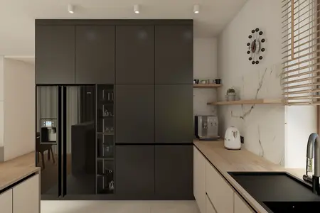 Kuchnia w stylu japandi i minimalistycznym z czarnymi meblami i drewnianym blatem.