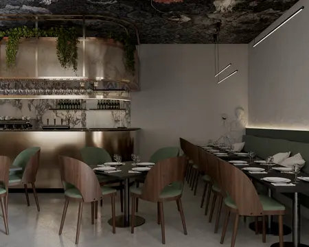 Wnętrze restauracji z glamour i nowoczesnym stylem, zielone krzesła, marmurowy bar.