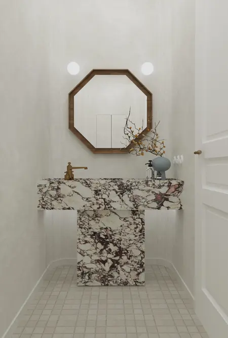 Wnętrze łazienki z marmurową umywalką, lustrem i minimalistycznymi dodatkami, art deco, minimaluxe, quiet luxury.