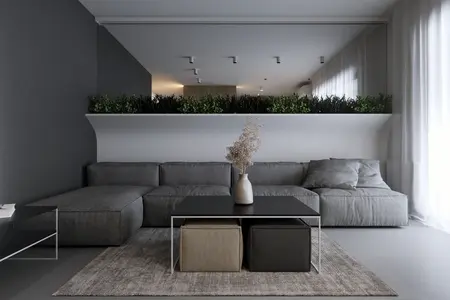 Wnętrze salonu w stylu eklektycznym i minimalistycznym z szarym narożnikiem i roślinami.