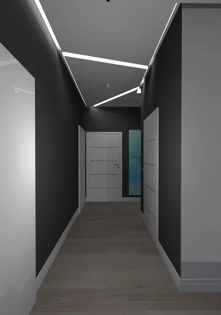 Korytarz w stylu japandi z minimalistycznym oświetleniem i drewnianą podłogą.