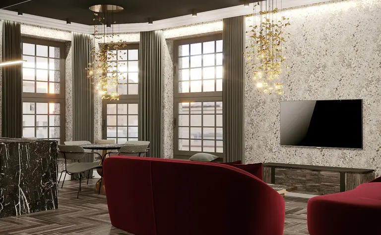 Wnętrze salonu w stylu art deco z czerwonymi sofami i marmurowymi akcentami.
