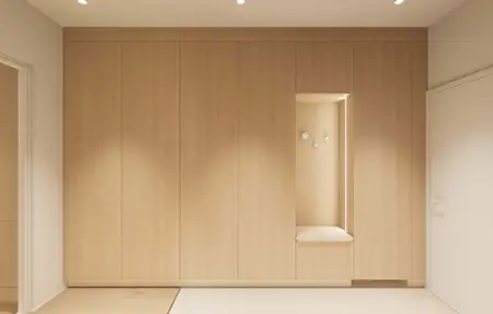 Przedpokój w stylu japandi z minimalistycznym umeblowaniem i nowoczesnymi detalami.