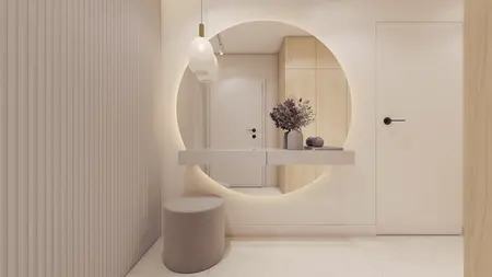 Przedpokój z lustrzanym okręgiem, drewnianymi detalami, styl minimaluxe i nowoczesny.