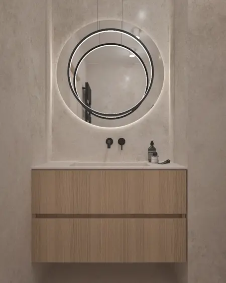 Wnętrze łazienki z drewnianą szafką i okrągłym lustrem, styl boho, japandi, minimalistyczny.