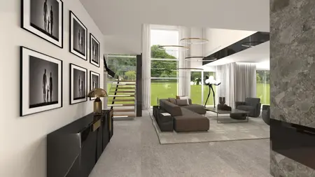 Wnętrze nowoczesnego salonu z dużymi oknami i designerską sofą.