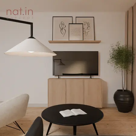 Wnętrze salonu w stylu japandi z białą lampą, telewizorem i drewnianymi akcentami.