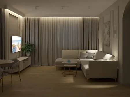 Wnętrze salonu w stylu quiet luxury z jasnymi meblami i eleganckim oświetleniem.